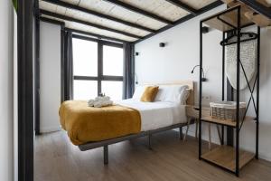 Posteľ alebo postele v izbe v ubytovaní Vip Apartments Valencia