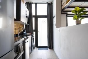 Kuchyňa alebo kuchynka v ubytovaní Vip Apartments Valencia