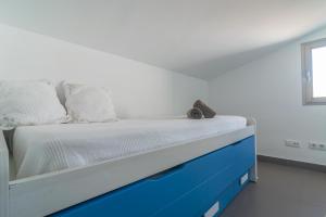 Ein Bett oder Betten in einem Zimmer der Unterkunft Mar Colonia