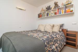 Ein Bett oder Betten in einem Zimmer der Unterkunft Mar Colonia