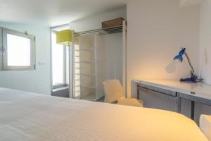 Ein Bett oder Betten in einem Zimmer der Unterkunft Mar Colonia