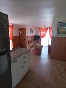 Η κουζίνα ή μικρή κουζίνα στο Cabañas MANA NUI INN
