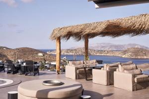 a resort with a view of the ocean at Liostasi in Ios Chora