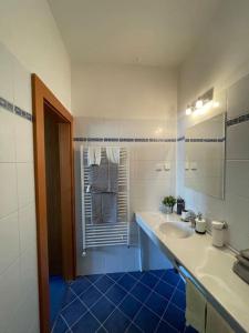 a bathroom with a sink and a mirror at Apartmán Obchodná in Staré Mesto