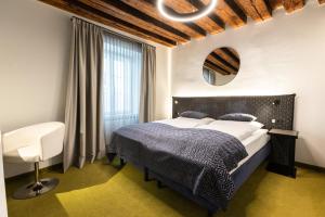 Posteľ alebo postele v izbe v ubytovaní Boutiquehotel am Dom + 18 fotografií