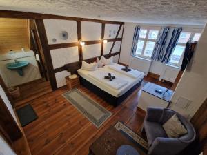 Fotografija v galeriji nastanitve Zum Alten Schulhaus v mestu Burg