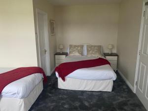 Ένα ή περισσότερα κρεβάτια σε δωμάτιο στο Suantrai Accommodation