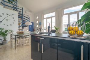 Kuchyňa alebo kuchynka v ubytovaní Casa Acogedora + 23 fotografií