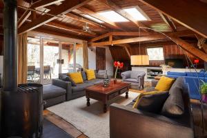 Posezení v ubytování Huis met de Leeuwenkoppen