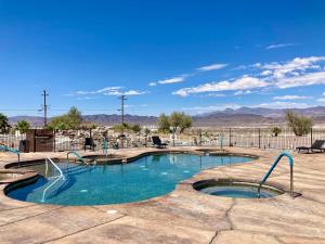 a swimming pool in the middle of a park at Death Valley Hot Springs in Tecopa