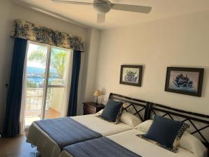 Posteľ alebo postele v izbe v ubytovaní Lyrioshomes Precioso Apartamento Puerto de Estepona