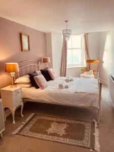 מיטה או מיטות בחדר ב-Penthouse Sea view home