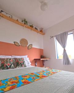 Ένα ή περισσότερα κρεβάτια σε δωμάτιο στο A Casa da Kali