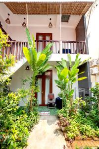 Zahrada ubytování Pink Beach Homestay
