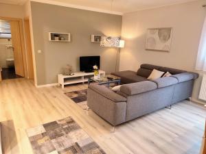 Χώρος καθιστικού στο Ferienwohnung An der Korkeiche