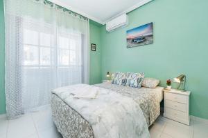 Posteľ alebo postele v izbe v ubytovaní Bungalow Sunrise Europa