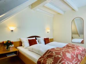 Postel nebo postele na pokoji v ubytování Im Winkel Appartements und Zimmer