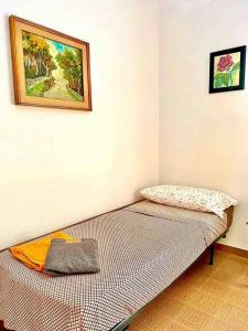 Ένα ή περισσότερα κρεβάτια σε δωμάτιο στο Appartamento a Tempio Pausania