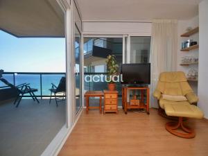 a living room with a view of the ocean at Fanals 5B in Platja d'Aro