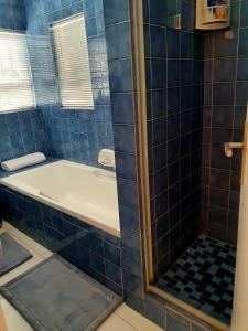 Koupelna v ubytování La Grace Executive Guesthouse