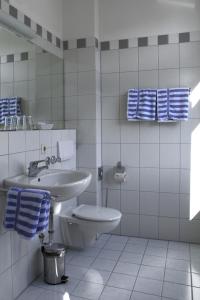 Koupelna v ubytování Gasthaus Sternen Post + 32 fotografií
