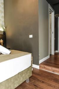 Posteľ alebo postele v izbe v ubytovaní Il Corso Comfort Rooms