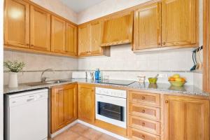 Kuchyň nebo kuchyňský kout v ubytování Sa Mirada Apartment
