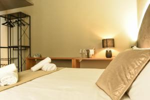 Posteľ alebo postele v izbe v ubytovaní Il Corso Comfort Rooms