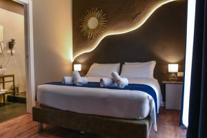 Posteľ alebo postele v izbe v ubytovaní Il Corso Comfort Rooms