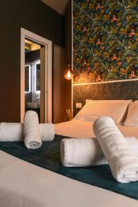 Posteľ alebo postele v izbe v ubytovaní Il Corso Comfort Rooms