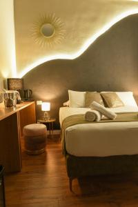 Posteľ alebo postele v izbe v ubytovaní Il Corso Comfort Rooms