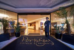 a man standing in front of a hotel lobby at PortoBay Rio de Janeiro in Rio de Janeiro