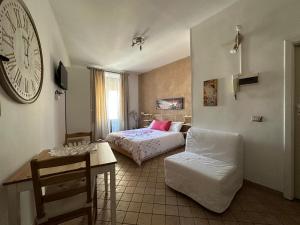A bed or beds in a room at The Civita Apt Town Center