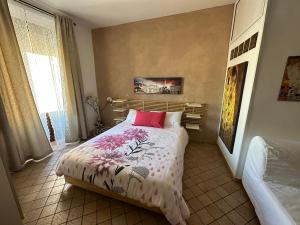 A bed or beds in a room at The Civita Apt Town Center