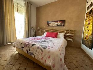 A bed or beds in a room at The Civita Apt Town Center