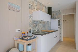 Η κουζίνα ή μικρή κουζίνα στο Vakantiehuis Vicky - Julianadorp aan Zee