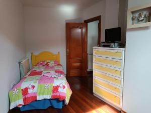 Łóżko lub łóżka w pokoju w obiekcie A Bruxo Fonte 8 pzs 2 baños Full Reg VUT38509