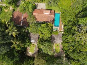 an overhead view of a house in the forest at The Jungle Loft Galle in Galle