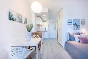 A bed or beds in a room at 797 HOLIDAY RENTALS - Espectacular estudio en Minerva Még 20 kép