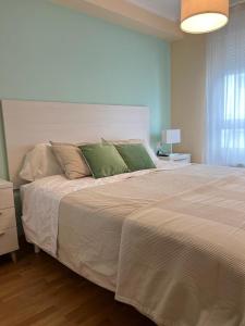 Posteľ alebo postele v izbe v ubytovaní Apartamentos Terraza playa