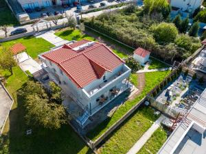 an aerial view of a house with a red roof at F&R VILLA in Neoi Epivates