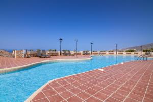 Bazén v ubytování Mirador Balcon del Atlantico y piscina privada nebo v jeho okolí