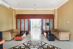 Posezení v ubytování Super OYO Collection O 3431 Hotel Alpha Bandara
