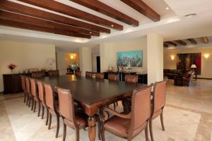 a dining room with a table and chairs at Casa Agostino - Luxury wine resort in Mendoza +42 photos