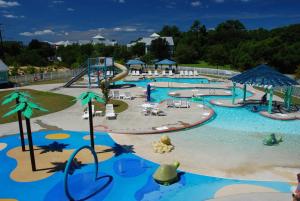 a water park with a water slide and a playground at Cambridge Reserve by KEES Vacations in Kill Devil Hills