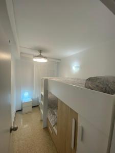Łóżko lub łóżka w pokoju w obiekcie Apartamento Fuengirola beach