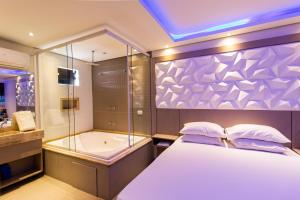 En eller flere senge i et værelse på Motel Veleiros - Zona Norte + 2 billeder