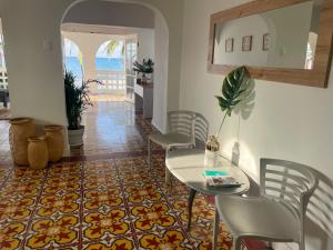 Uma área de estar em Puesta del Sol Guest House