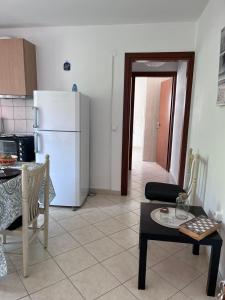 Kuchyň nebo kuchyňský kout v ubytování Kleio's Apartment