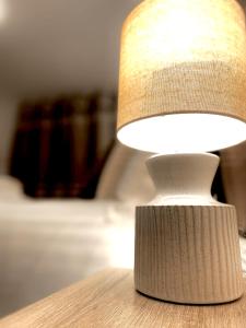 a close up of a lamp on a table at Angel view - 4 bed property- perfect for contractors & families in Milton Keynes